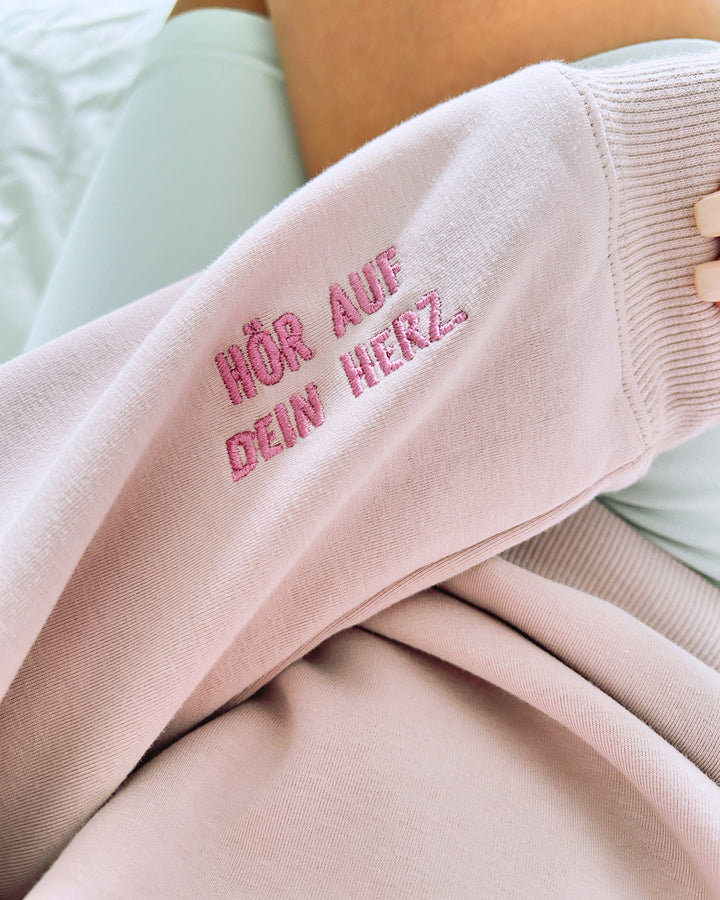 "Zwiespalt" Rundhals-Sweatshirt – Hör auf dein Herz.