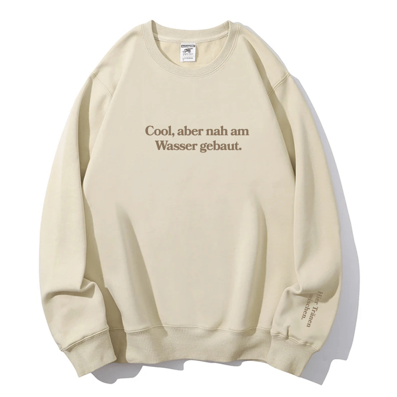 "Cool, aber nah am Wasser gebaut." Rundhals-Sweatshirt