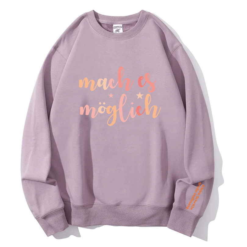 "mach es möglich" Rundhals-Sweatshirt – Kleine Schritte, große Hoffnung.