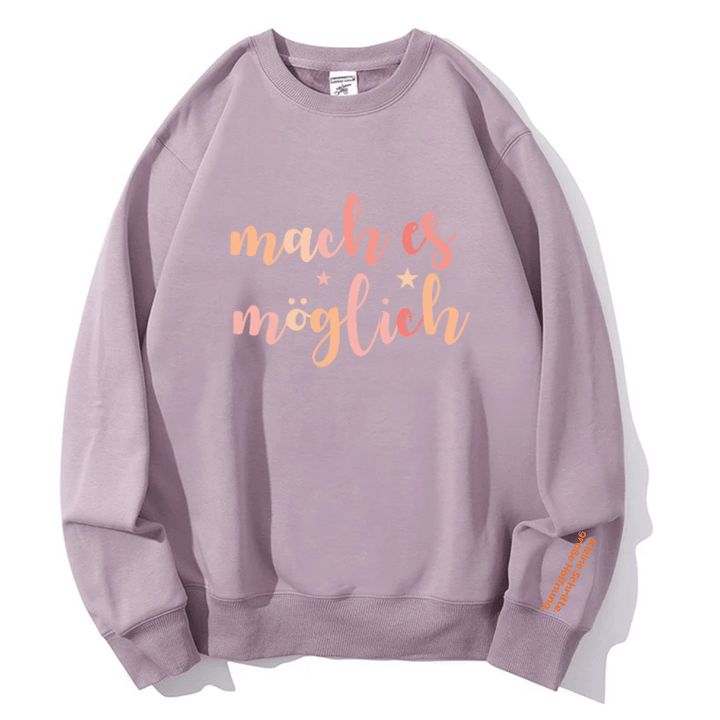 "mach es möglich" Rundhals-Sweatshirt – Kleine Schritte, große Hoffnung.