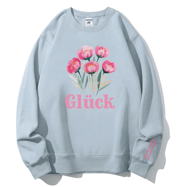 "Glück" Rundhals-Sweatshirt – Glück bringt innere Ruhe.