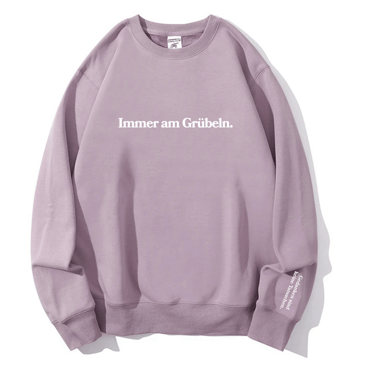 "Immer am Grübeln." Rundhals-Sweatshirt – Gedanken sind keine Tatsachen.