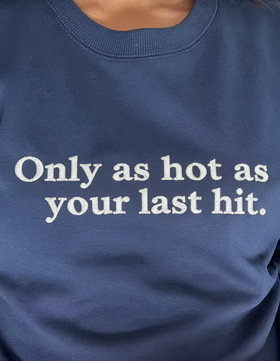 "You’re more than your last hit." Crewneck