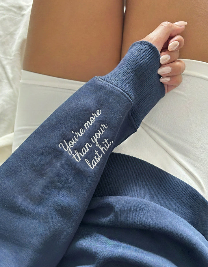 "You’re more than your last hit." Crewneck