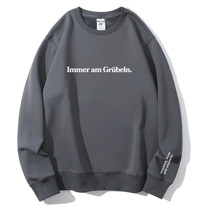 "Immer am Grübeln." Rundhals-Sweatshirt – Gedanken sind keine Tatsachen.