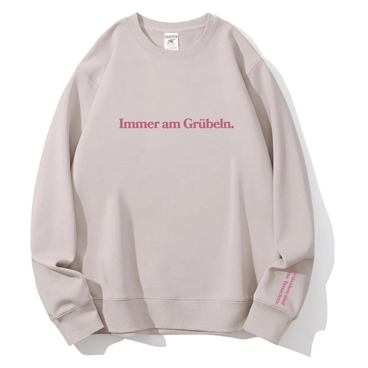 "Immer am Grübeln." Rundhals-Sweatshirt – Gedanken sind keine Tatsachen.