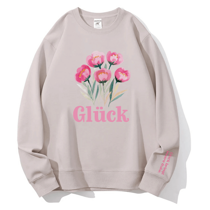 "Glück" Rundhals-Sweatshirt – Glück bringt innere Ruhe.