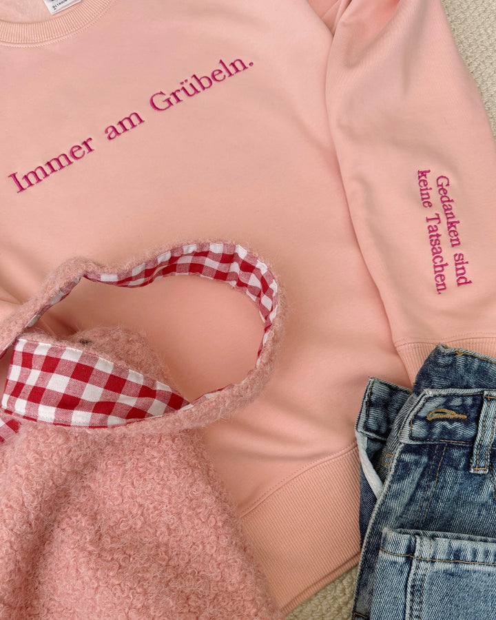 "Immer am Grübeln." Rundhals-Sweatshirt – Gedanken sind keine Tatsachen.