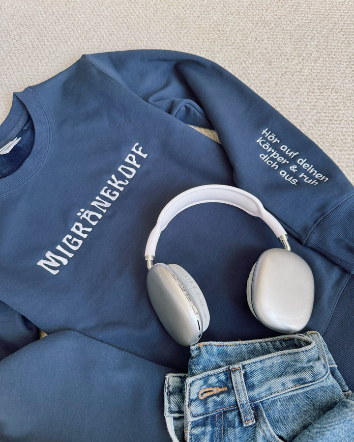 "Migränekopf" Rundhals-Sweatshirt – Hör auf deinen Körper & ruh dich aus.