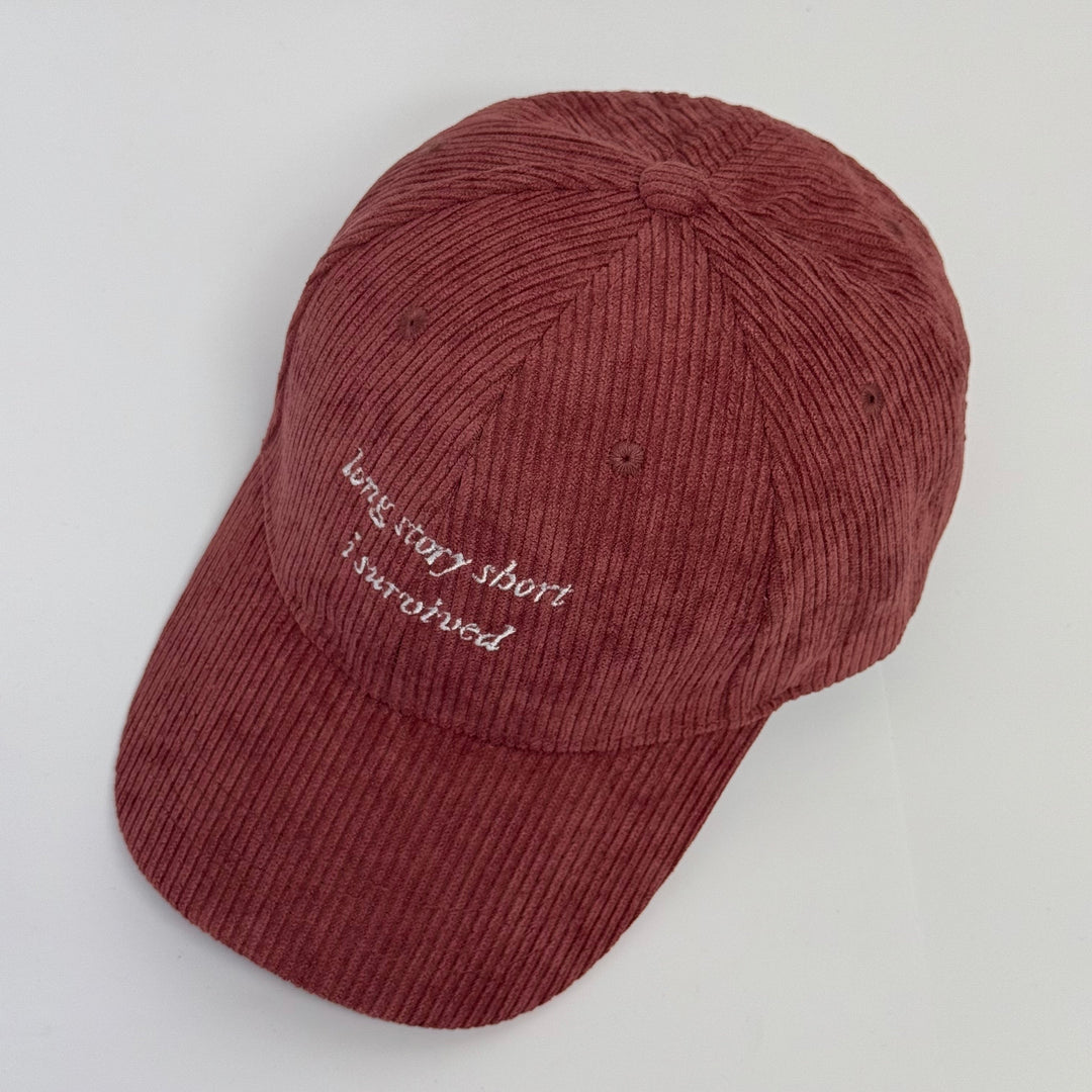 Bestickte Lyric-Kappe "I Survived"