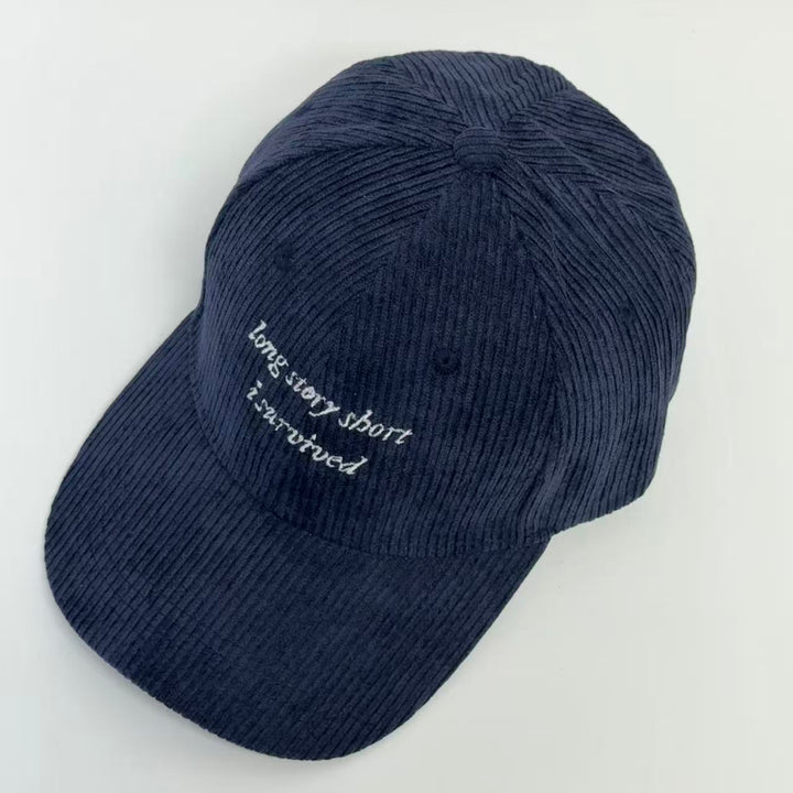 Bestickte Lyric-Kappe "I Survived"