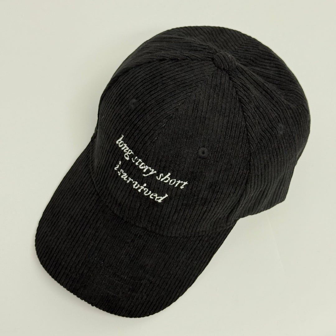 Bestickte Lyric-Kappe "I Survived"